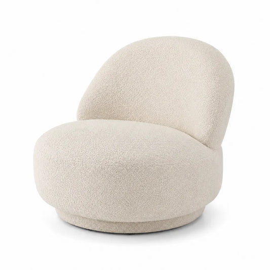 Poltrona in tessuto boucl¨¦ beige con schienale arrotondato